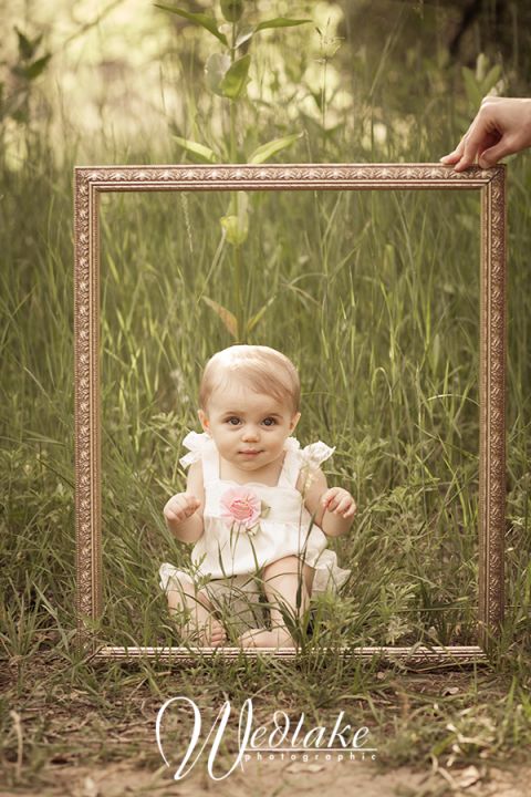 baby in picture frame idea